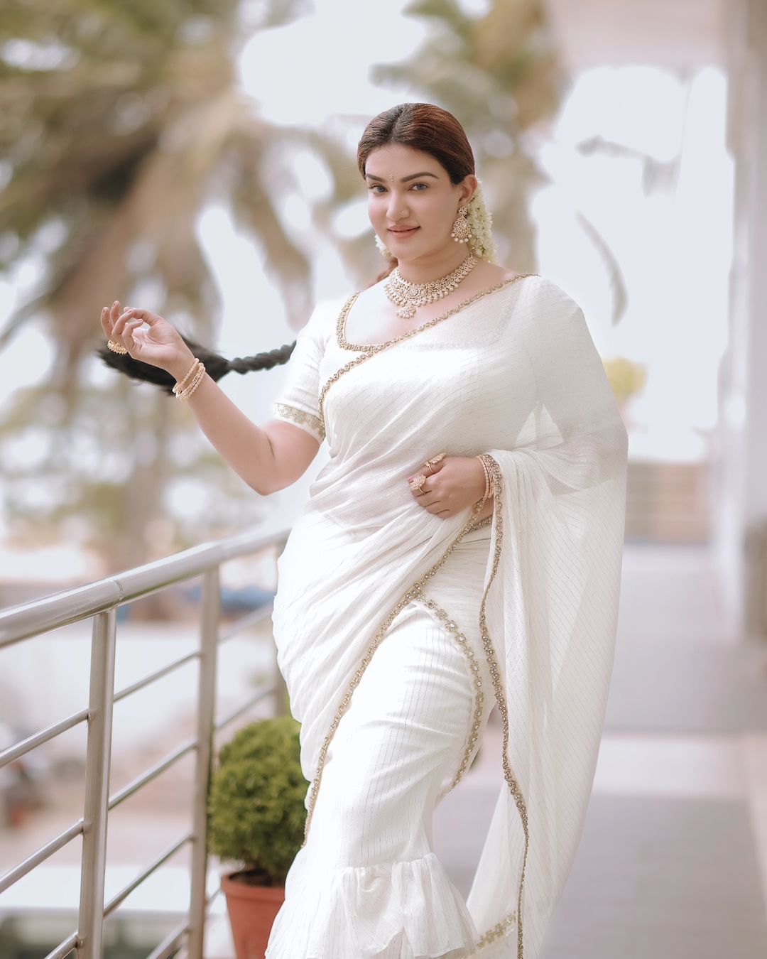 Honey Rose Stills in Sleeveless South Indian White Saree06